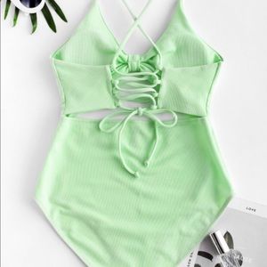 Neon green one piece bathing suit